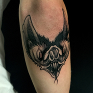 Mel-dragon_thigh_tattoo.jpeg